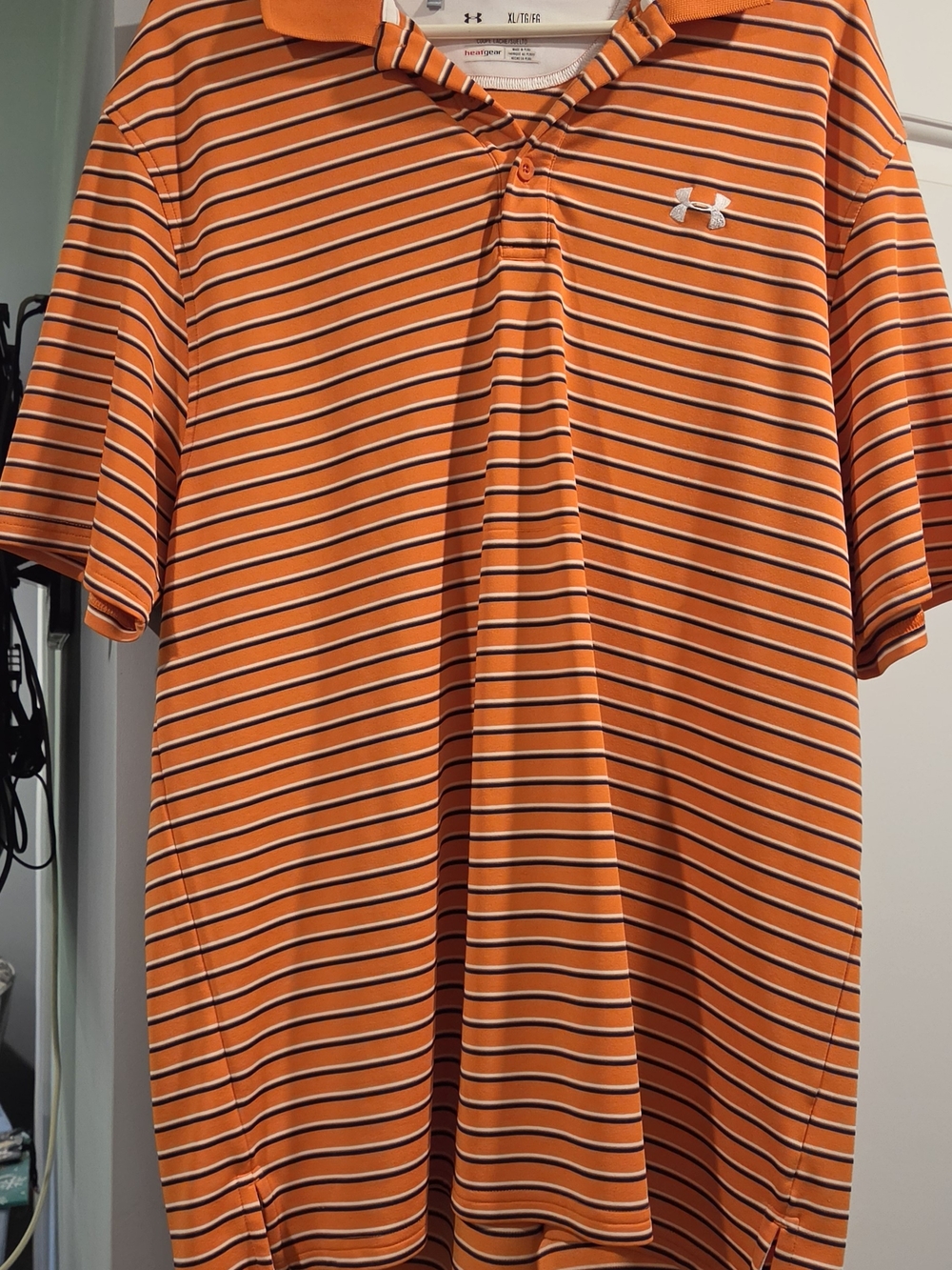 Under Armour Men’s Orange Striped Polo with White Logo